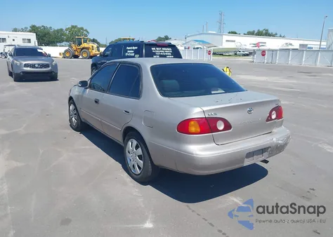 2001 Toyota Corolla Le z USA, uszkodzony, nr VIN 2T1BR12E01C396970